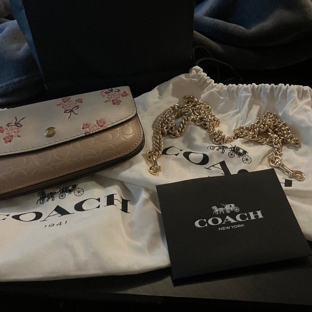 Coach Clutch In Signature Leather With Floral Bow Print